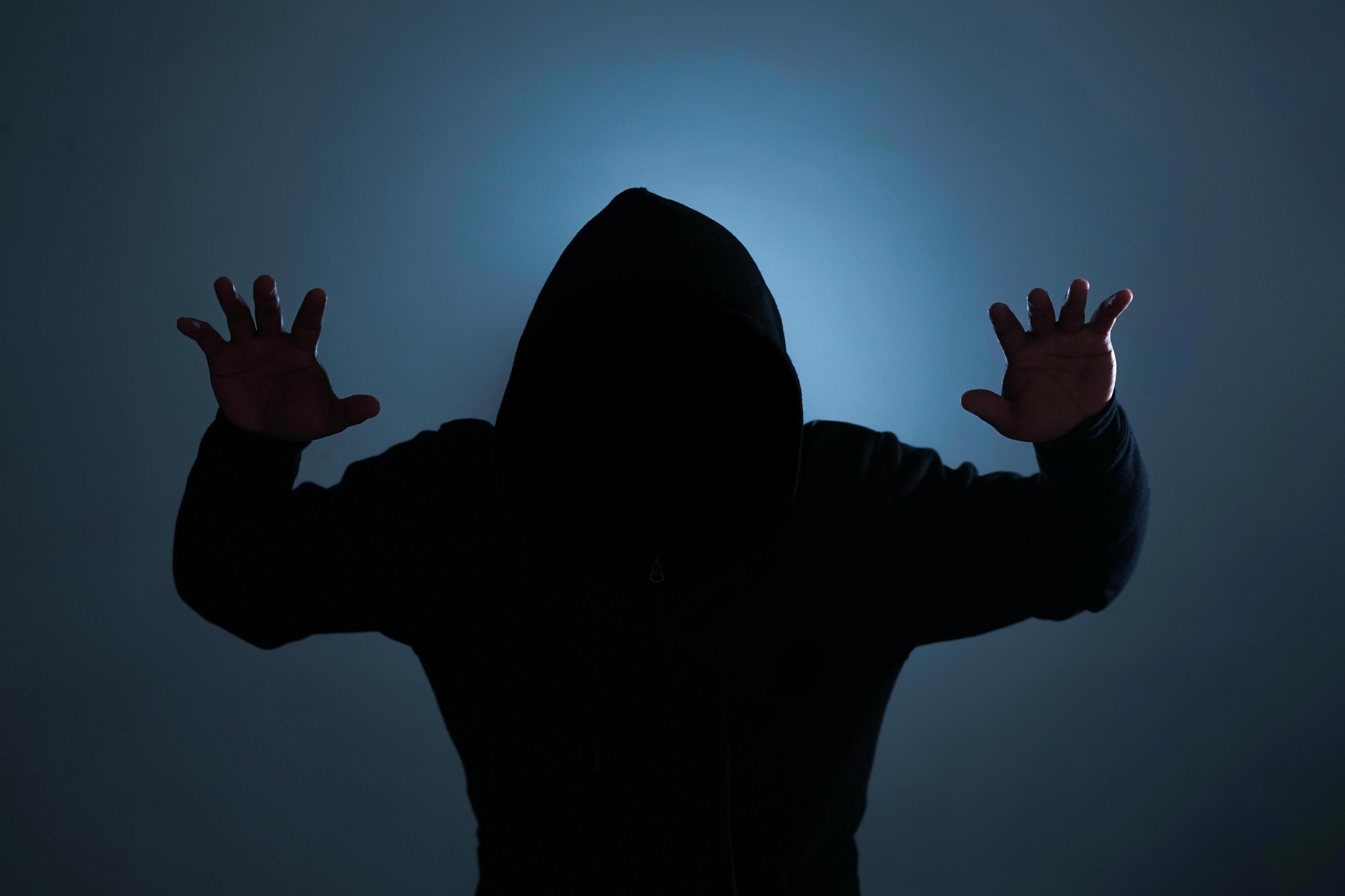 Indonesia, 21122021 - a silhouette of a man in a black hoodie 4909878 Stock  Photo at Vecteezy