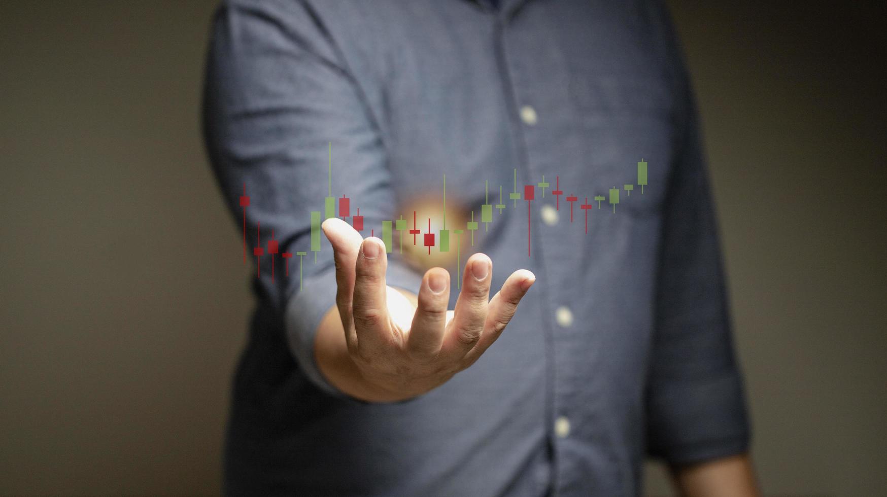 business man stock market forecast trend year, charts and candlesticks, stock market movement trend, past to present photo