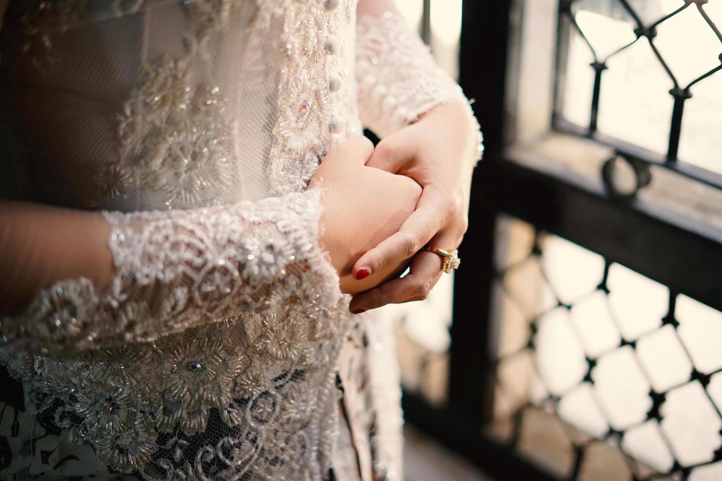 Luxurious wedding dress worn in ceremony photo