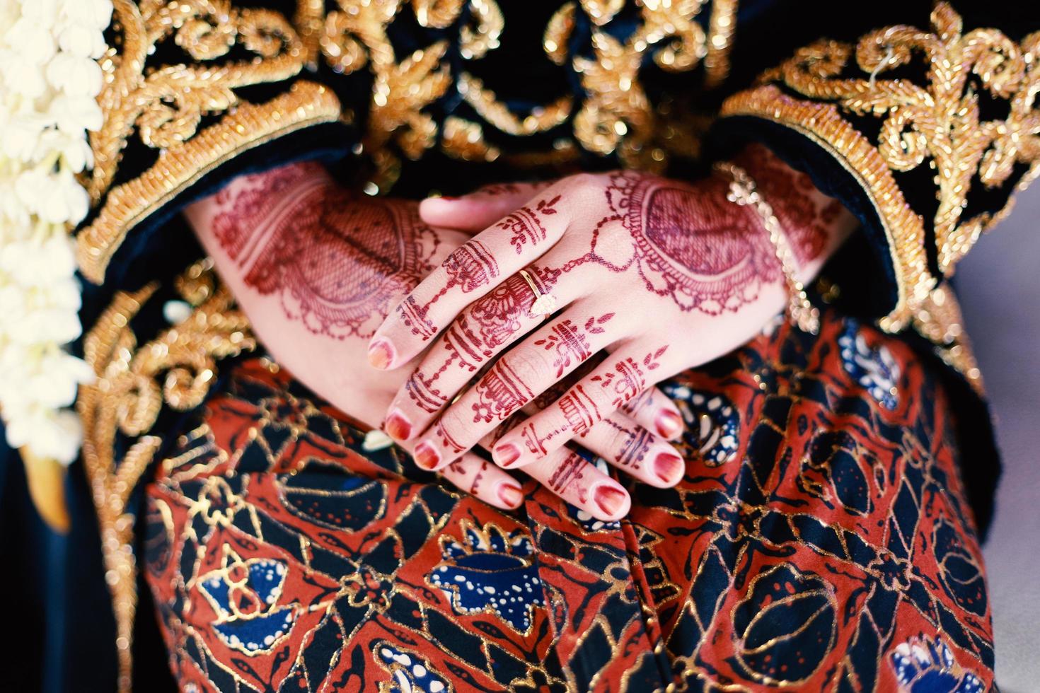 Bride henna carved beautiful and unique at bride's hand photo