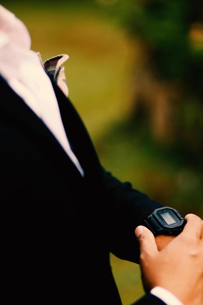 Man's watch on hand. Wedding ceremony photo