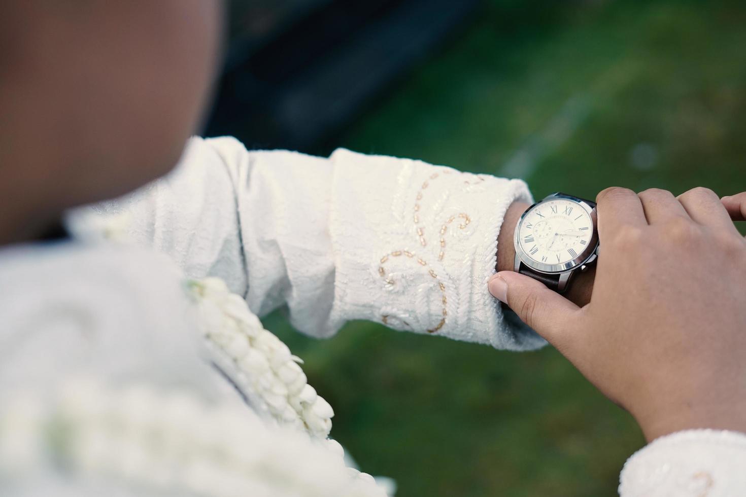 Man's watch on hand. Wedding ceremony photo