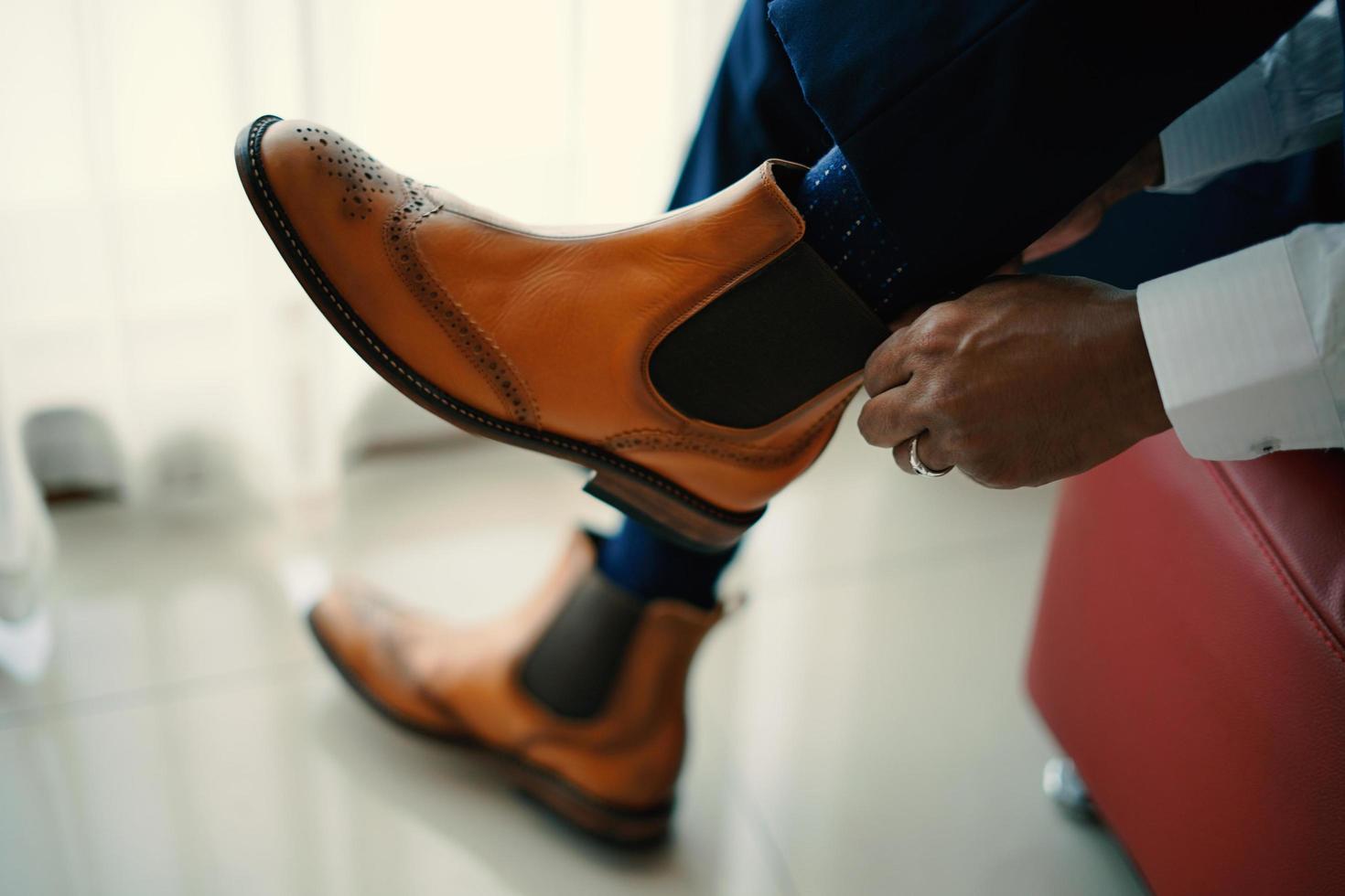 Stylish man in brown shoes photo