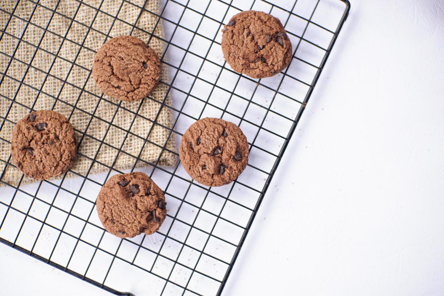 Chocolate cookies on a white table photo