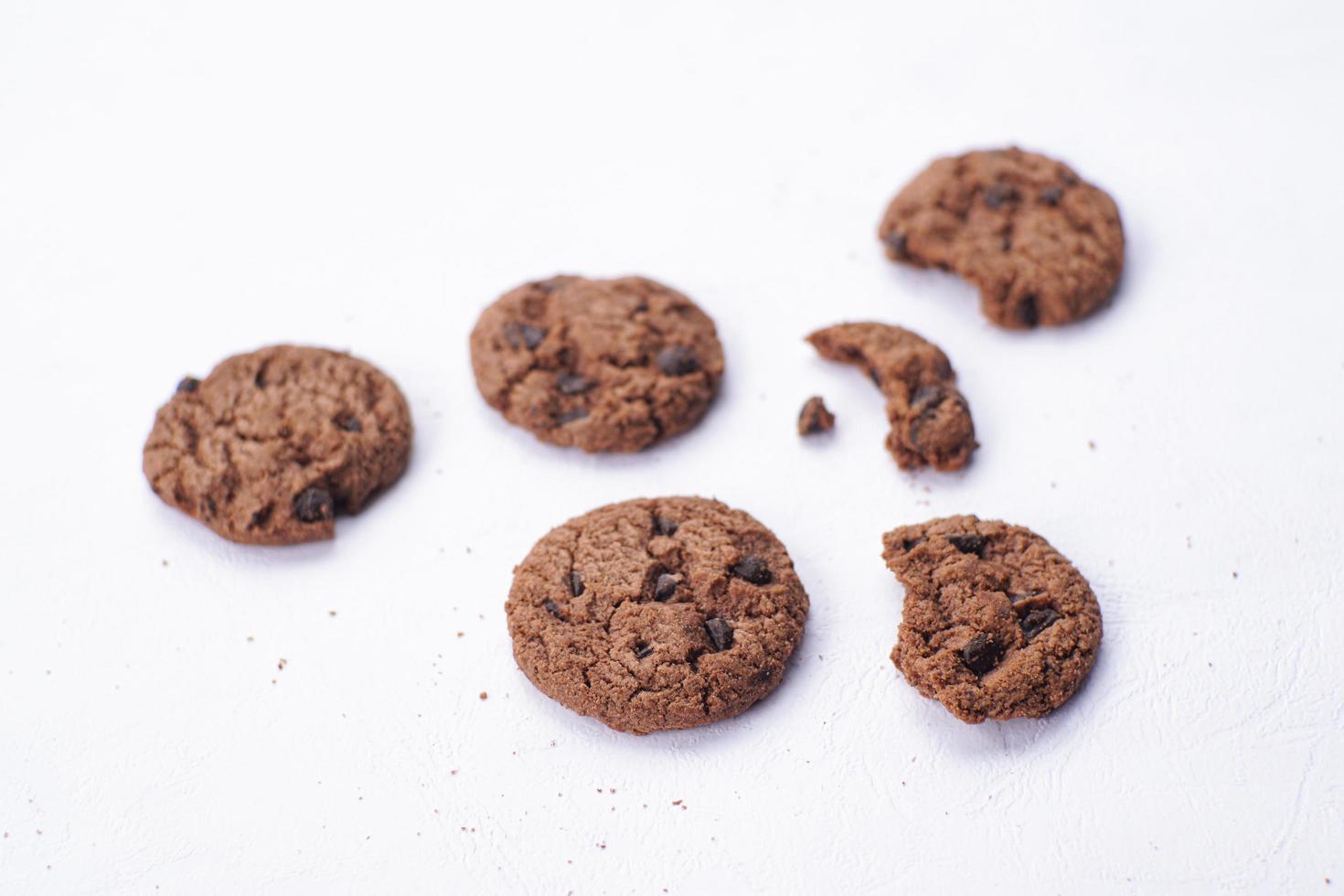 Chocolate cookies on a white table photo