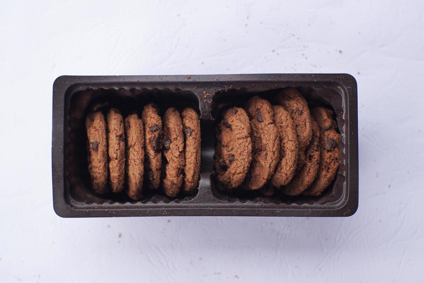 Chocolate cookies on a white table photo