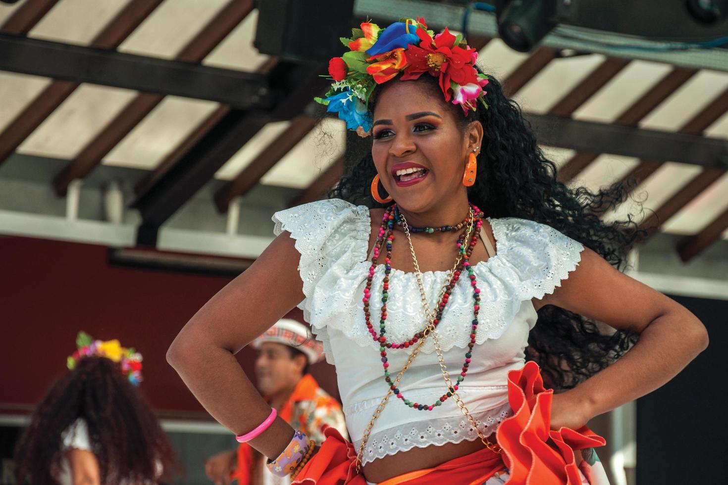 Nova Petropolis, Brazil - July 20, 2019. Brazilian female folk dancer performing a typical dance on 47th International Folklore Festival of Nova Petropolis. A rural town founded by German immigrants. photo