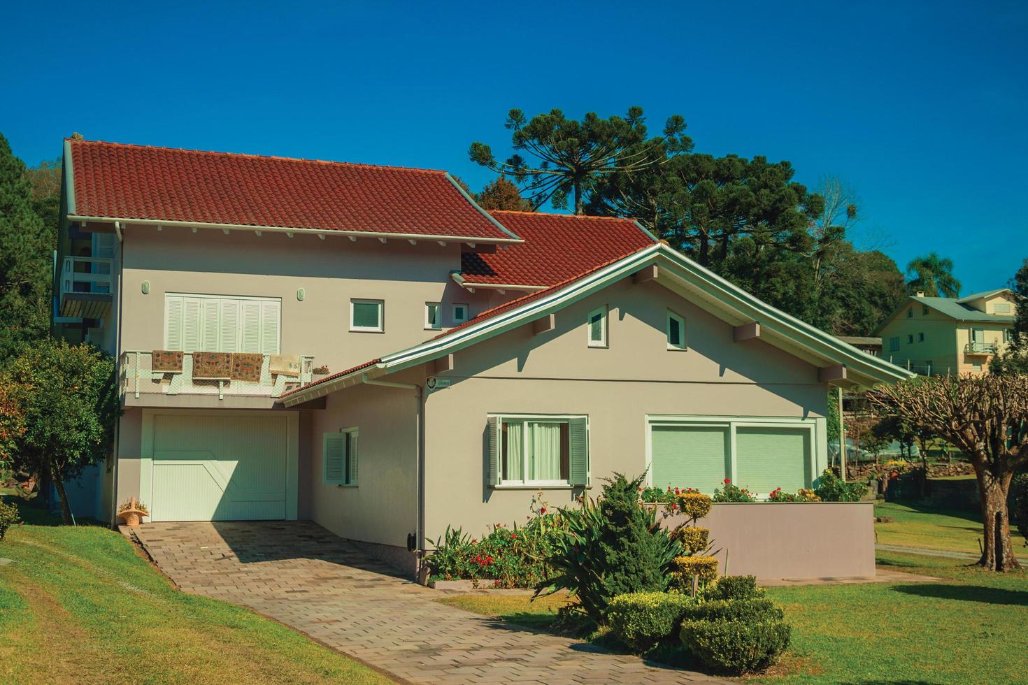 Bento Goncalves, Brazil - July 11, 2019. Modern country house with pathway and garden in a rural landscape near Bento Goncalves. photo