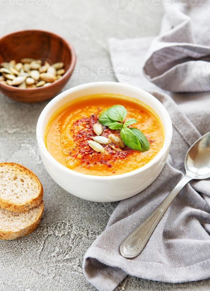 Bowl of pumpkin soup photo