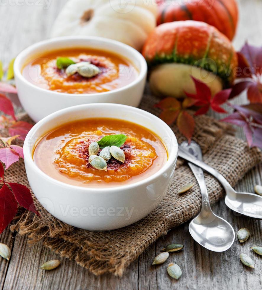 Bowls of pumpkin soup photo