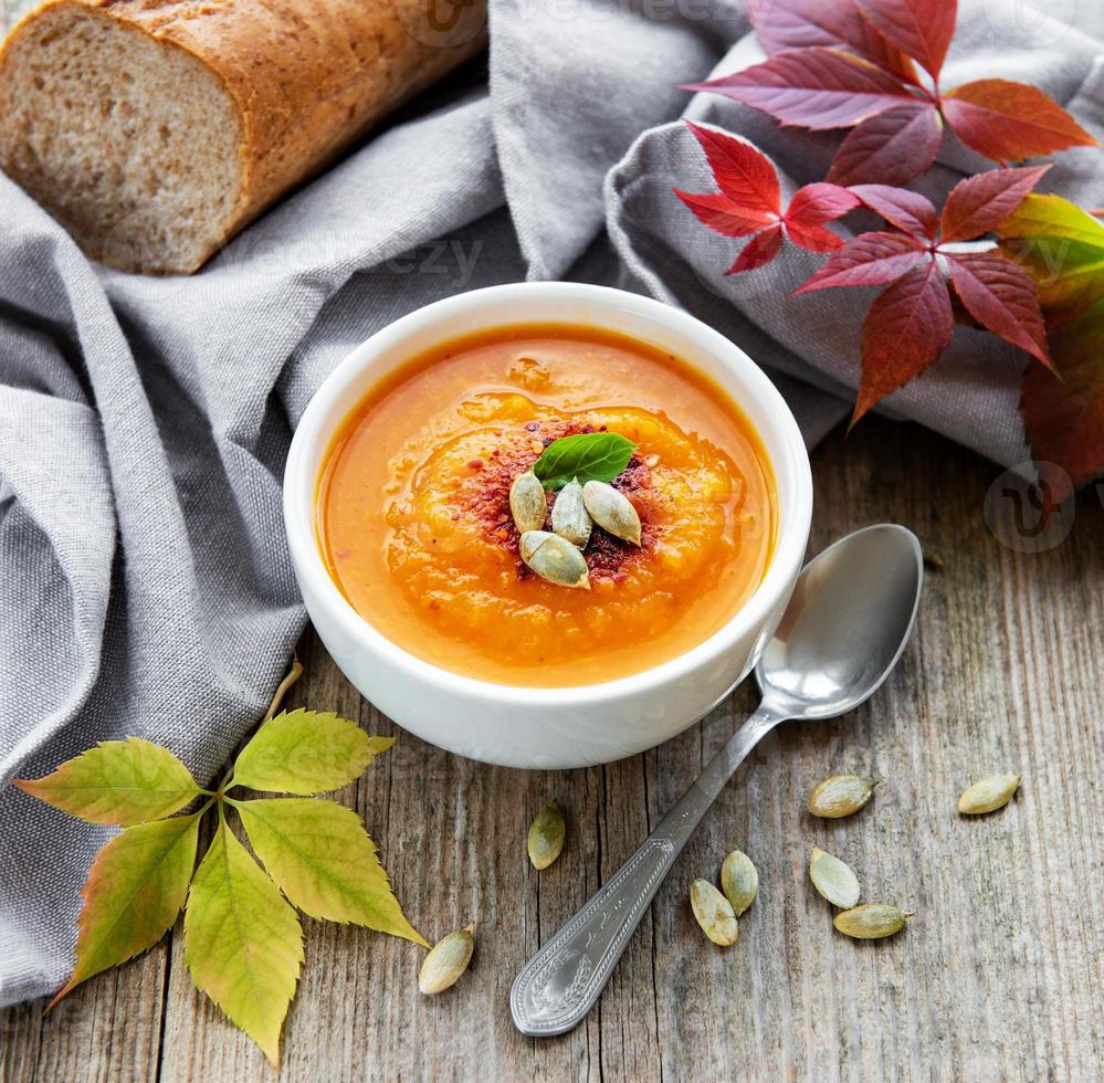 Bowl of pumpkin soup photo