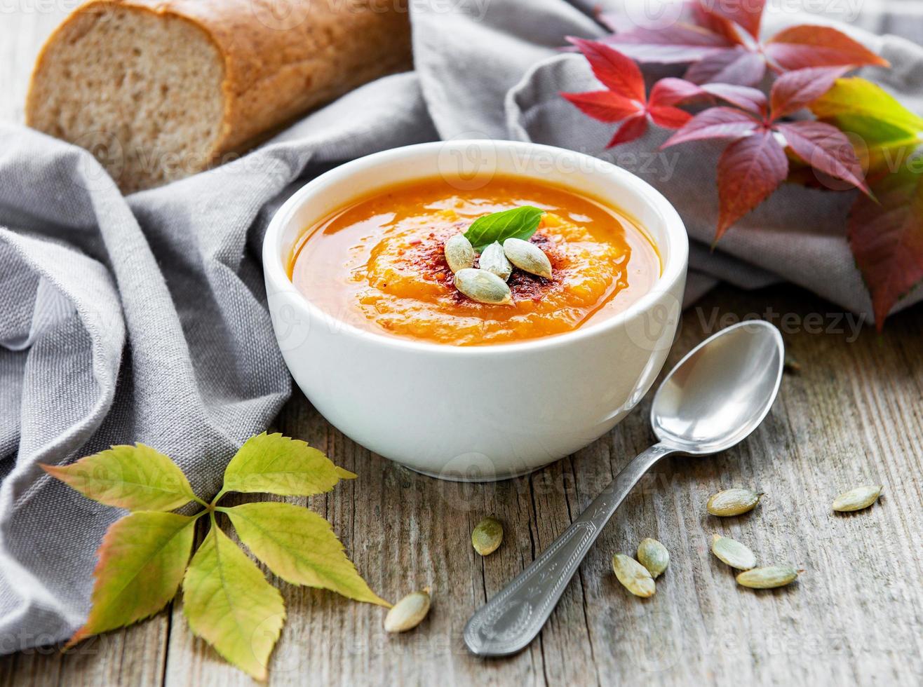 Bowl of pumpkin soup photo