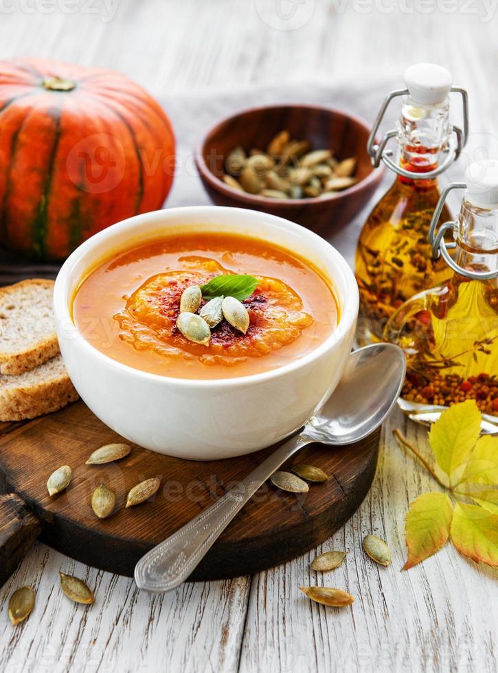 Bowl of pumpkin soup photo