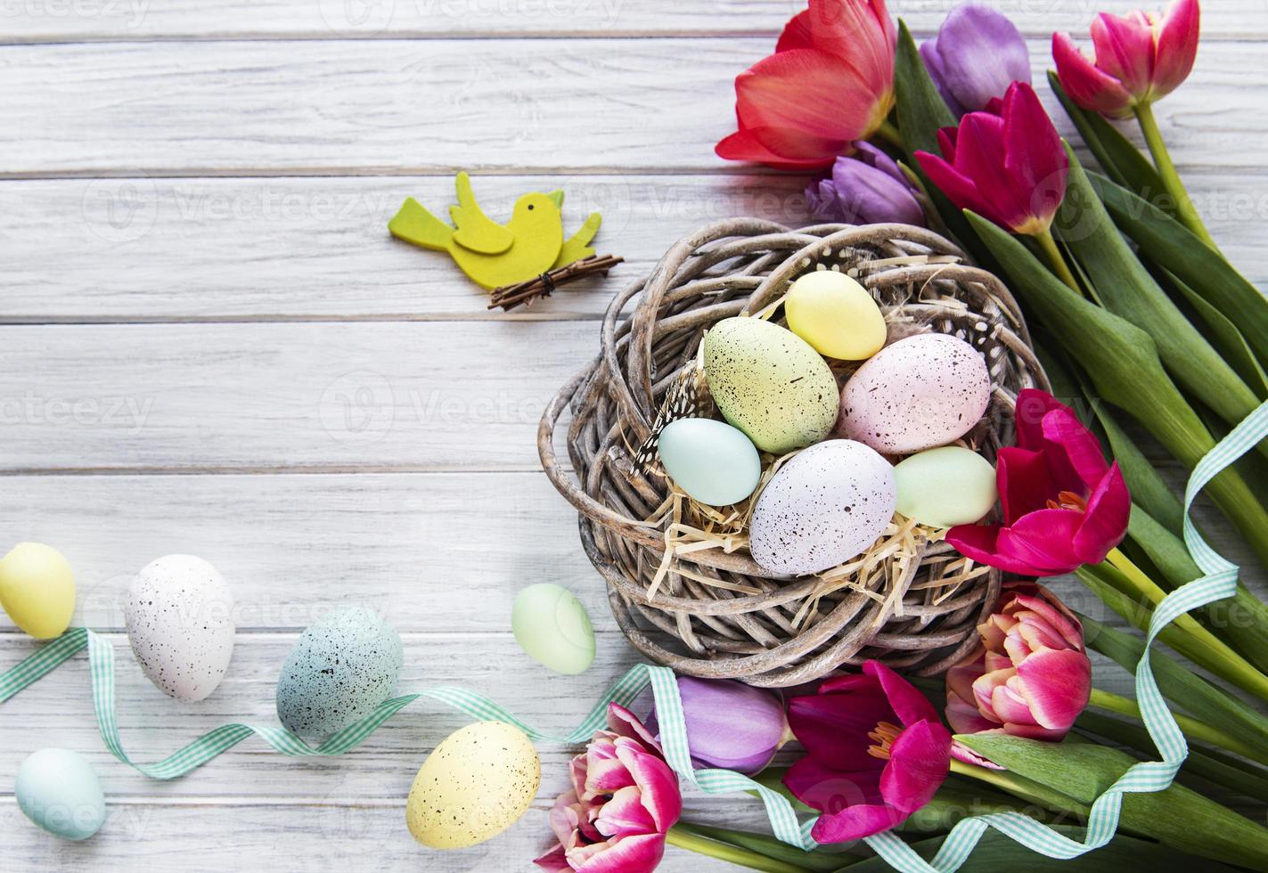 Easter eggs in nest photo