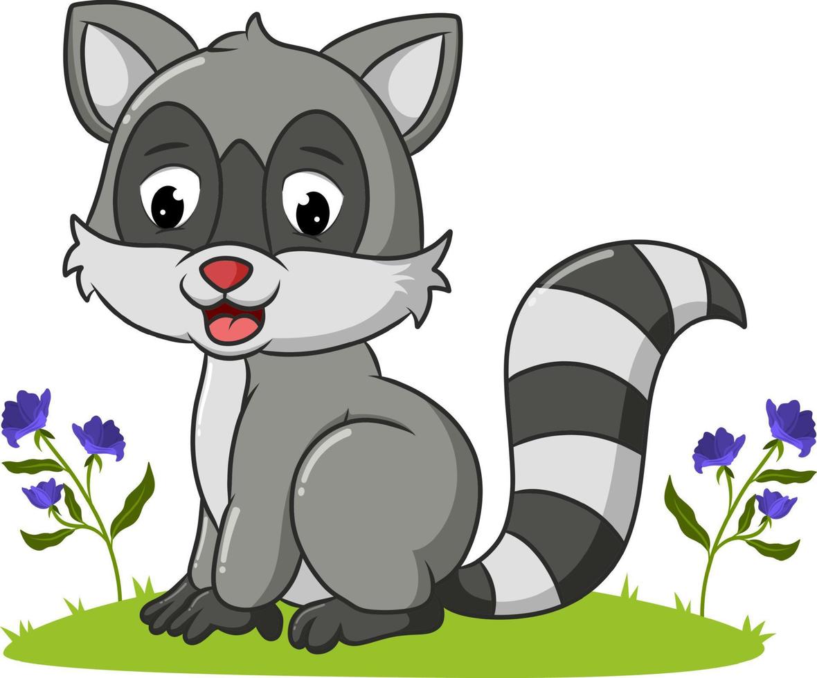 The raccoon is sitting in the garden vector