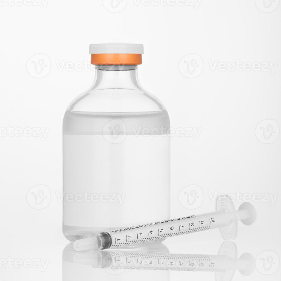 Vaccine concept. Medical injection vial with syringe photo