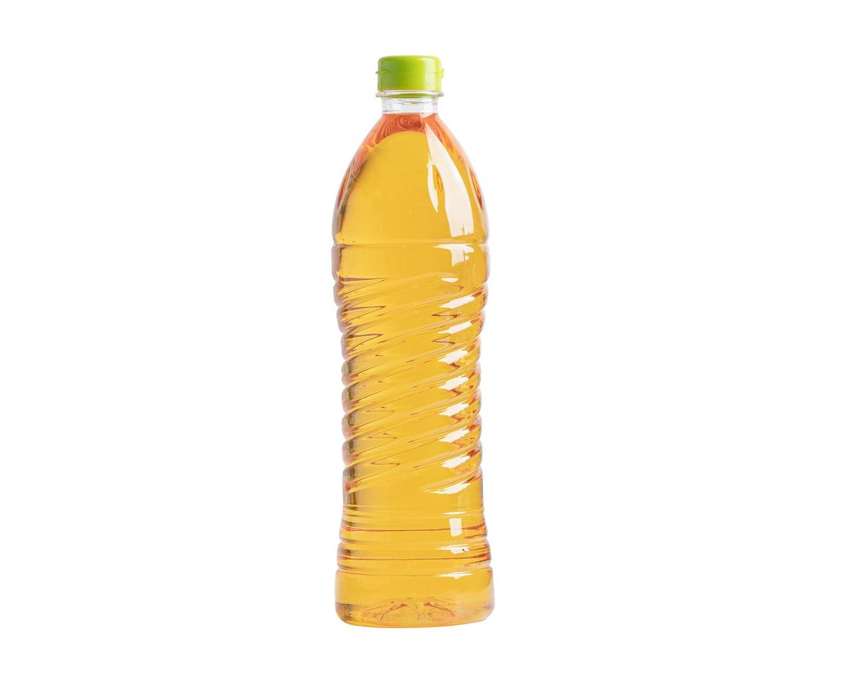 Vegetable oil bottle for cooking isolated on white background with clipping path. photo