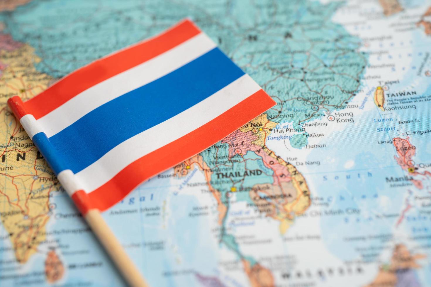 Bangkok, Thailand - December 7, 2021 Thailand flag on world map background. photo