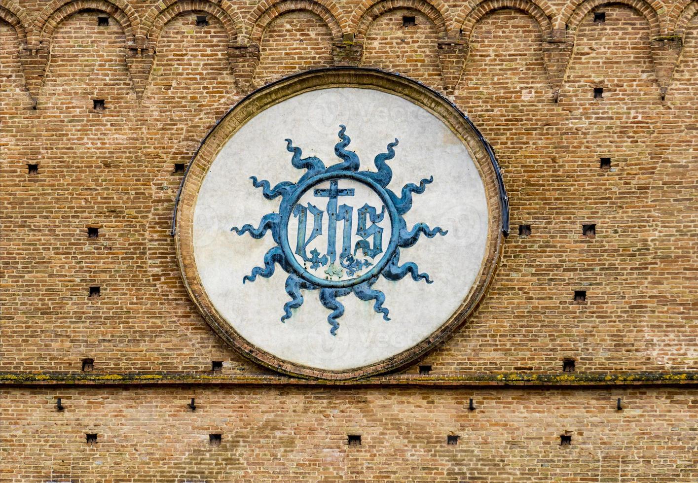 Cristograma en el palazzo publico en Siena, Italia foto