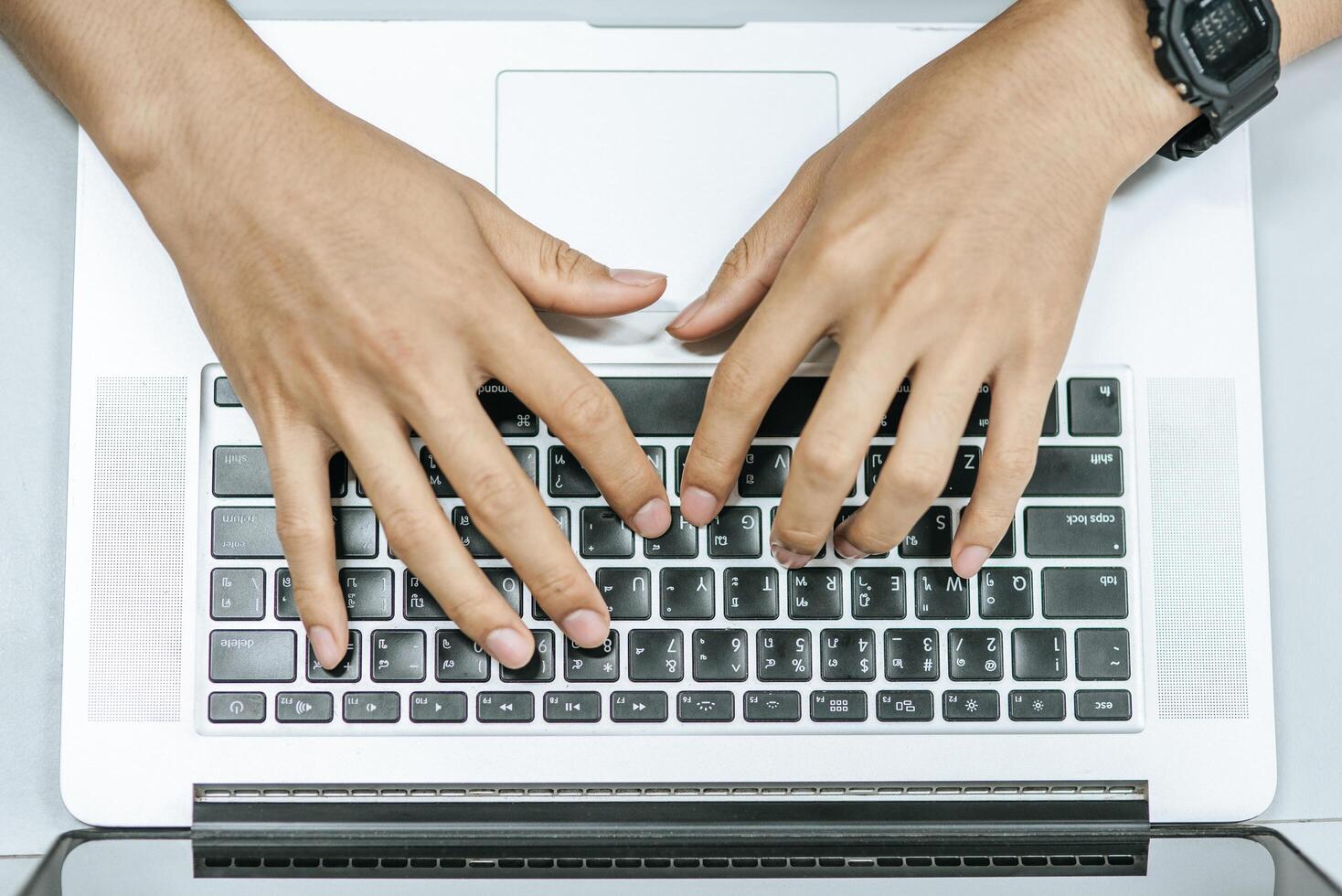 Men use laptops to search for information. photo