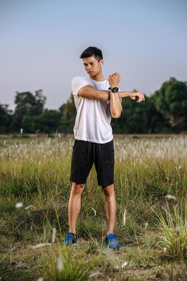 Men warm up before and after exercising photo