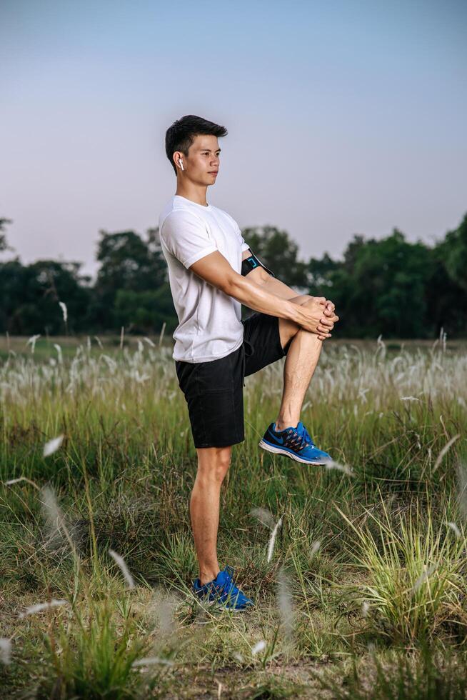 Men warm up before and after exercising photo