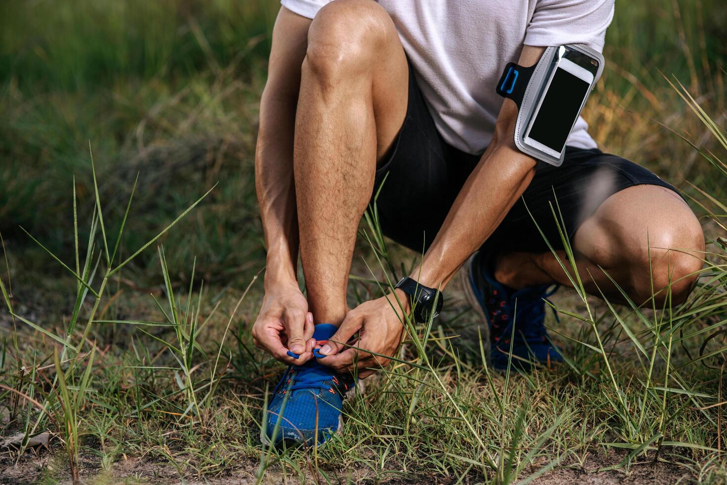 That man laced a shoelace to exercise photo