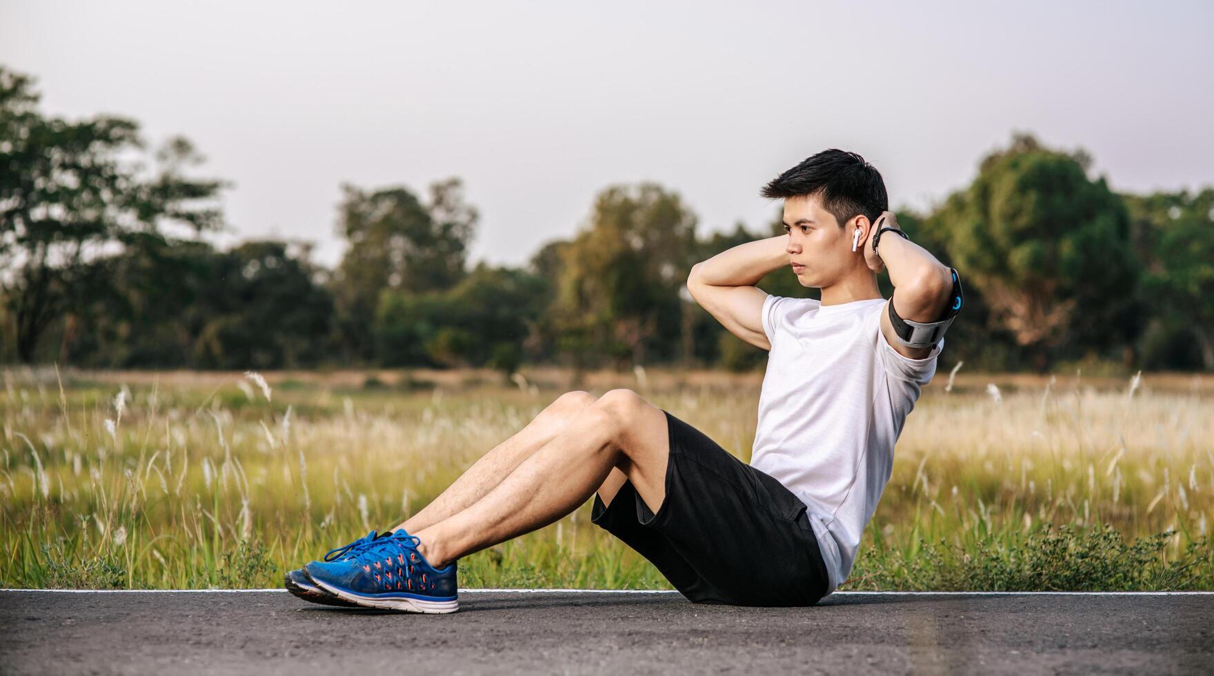 Men warm up before and after exercising photo