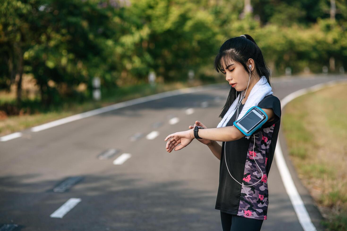 A woman stood relaxed after exercising. photo