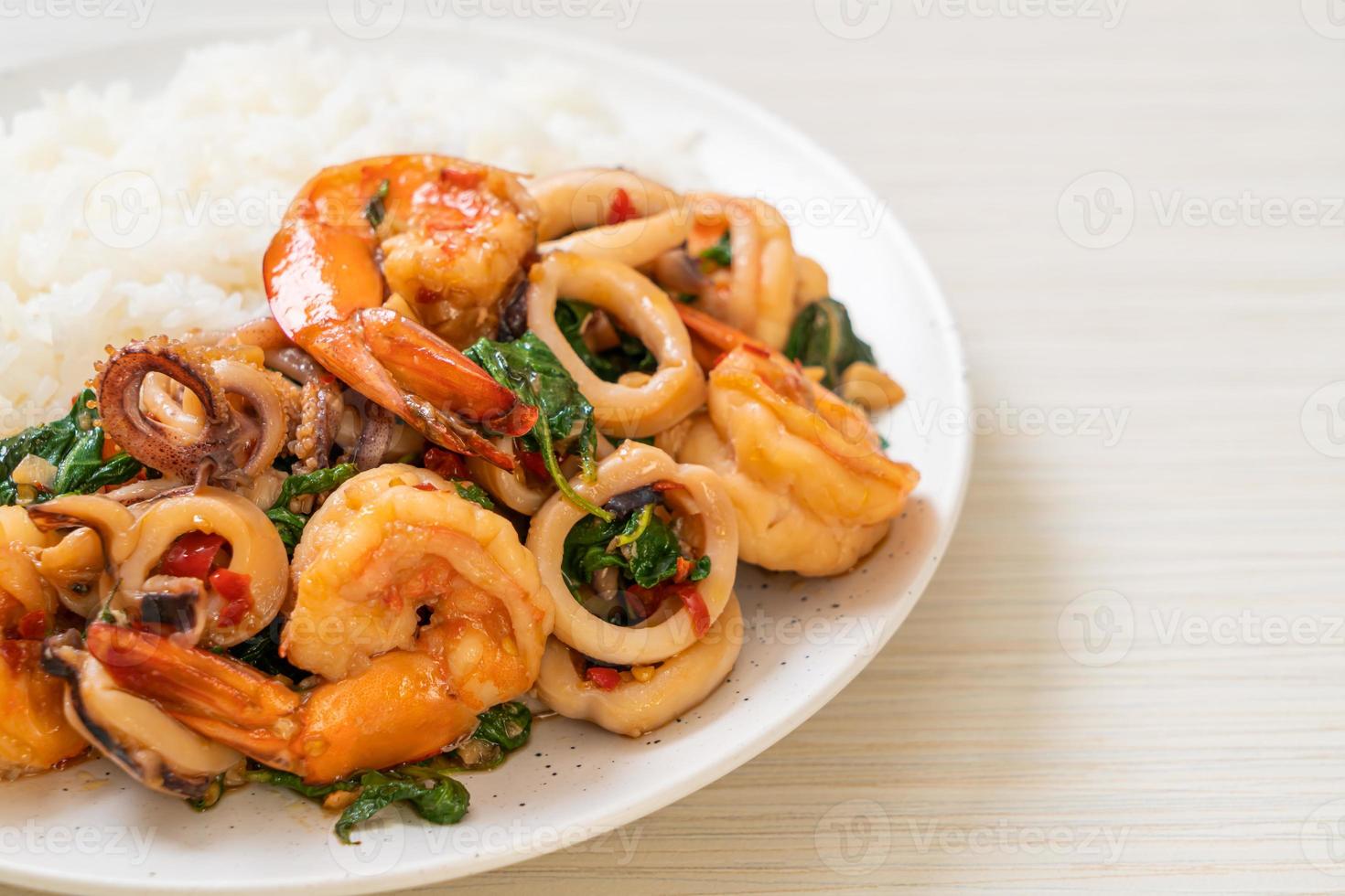 rice and stir-fried seafood with Thai basil photo