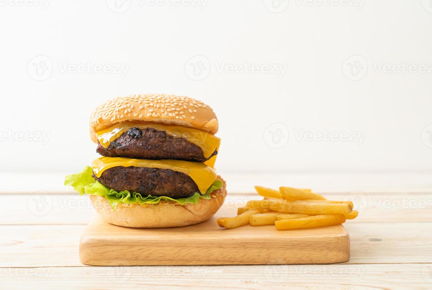 hamburger or beef burgers with cheese and french fries photo