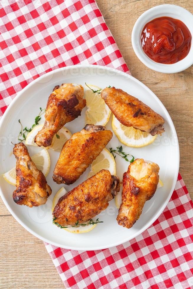 fried lemon pepper chicken wings photo