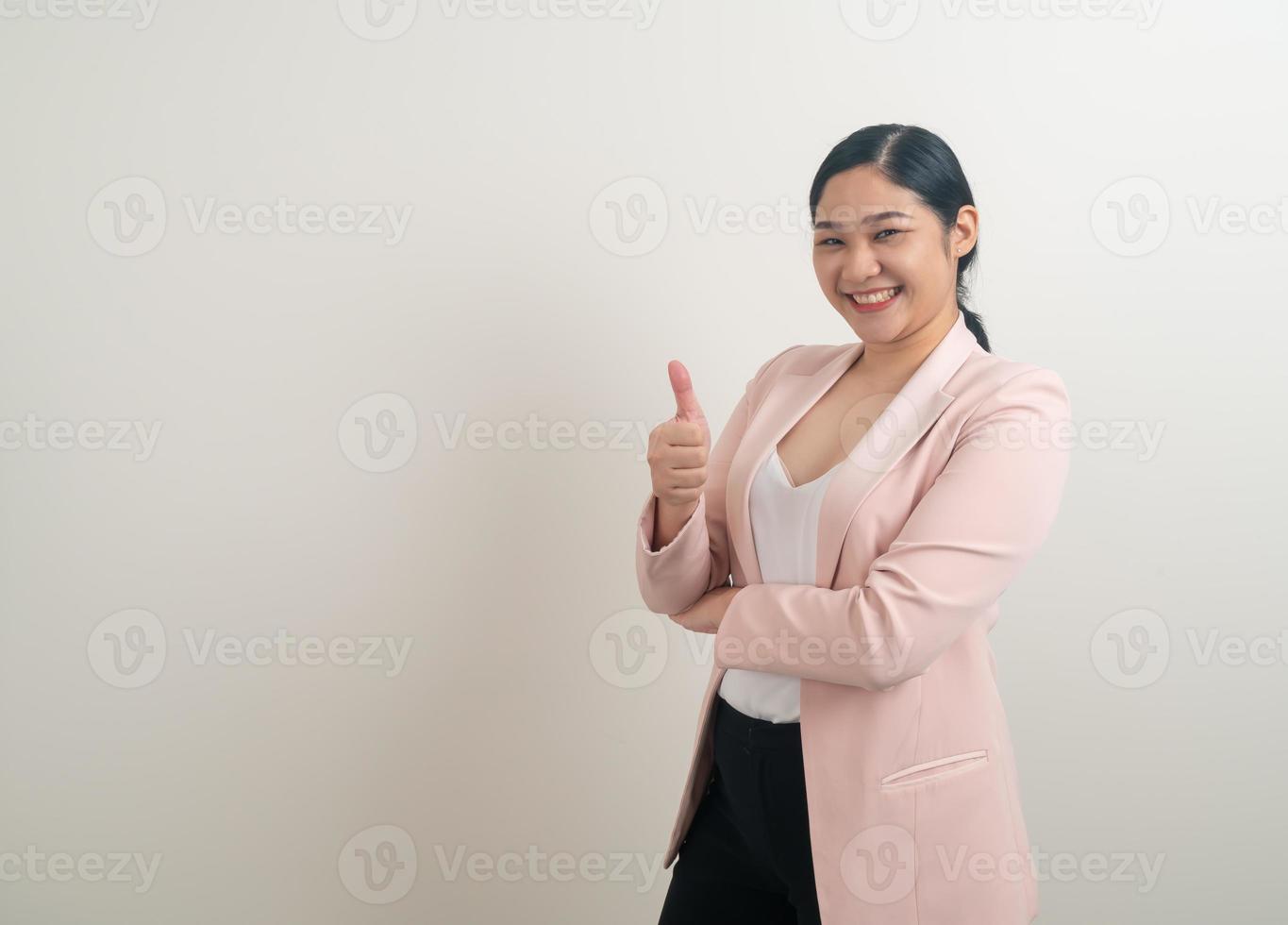 Asian woman with thumb up white background photo