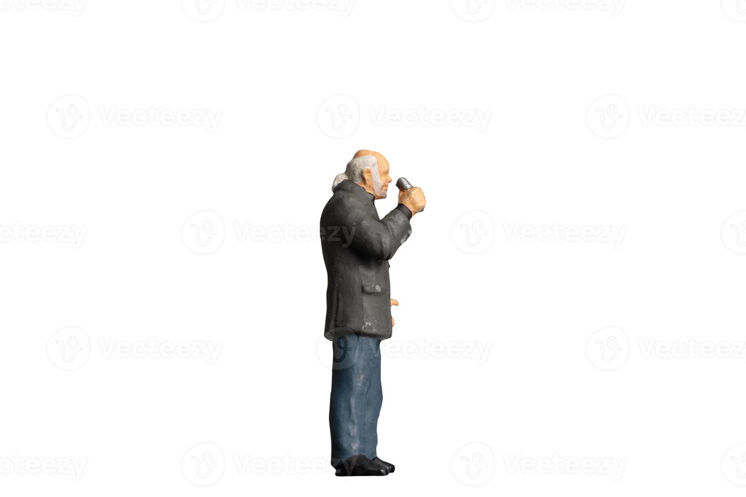 Reporter holding microphone  standing on white background with clipping path photo