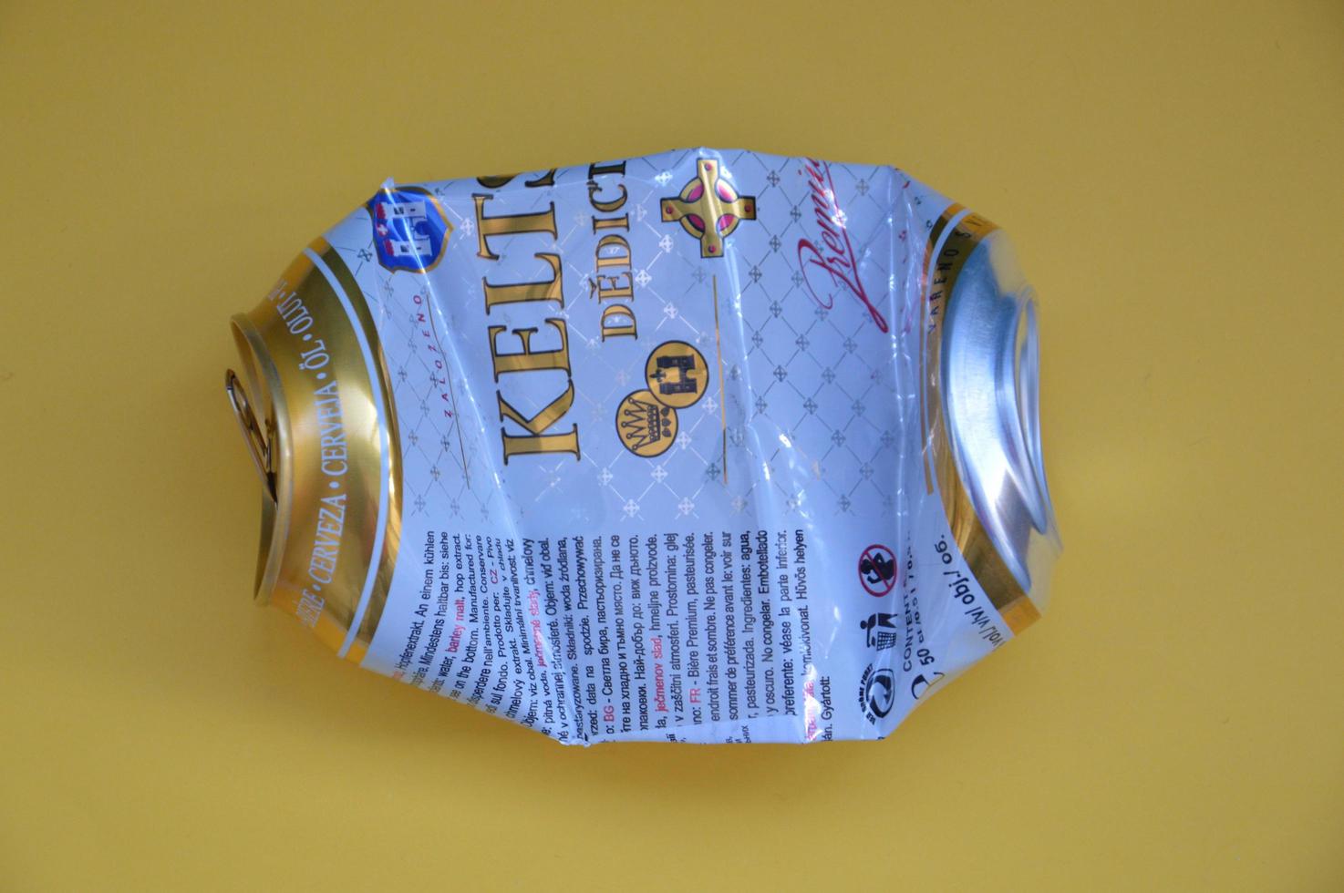 KIEV, UKRAINE - DECEMBER 22, 2021 Crumpled beer cans for scrap photo
