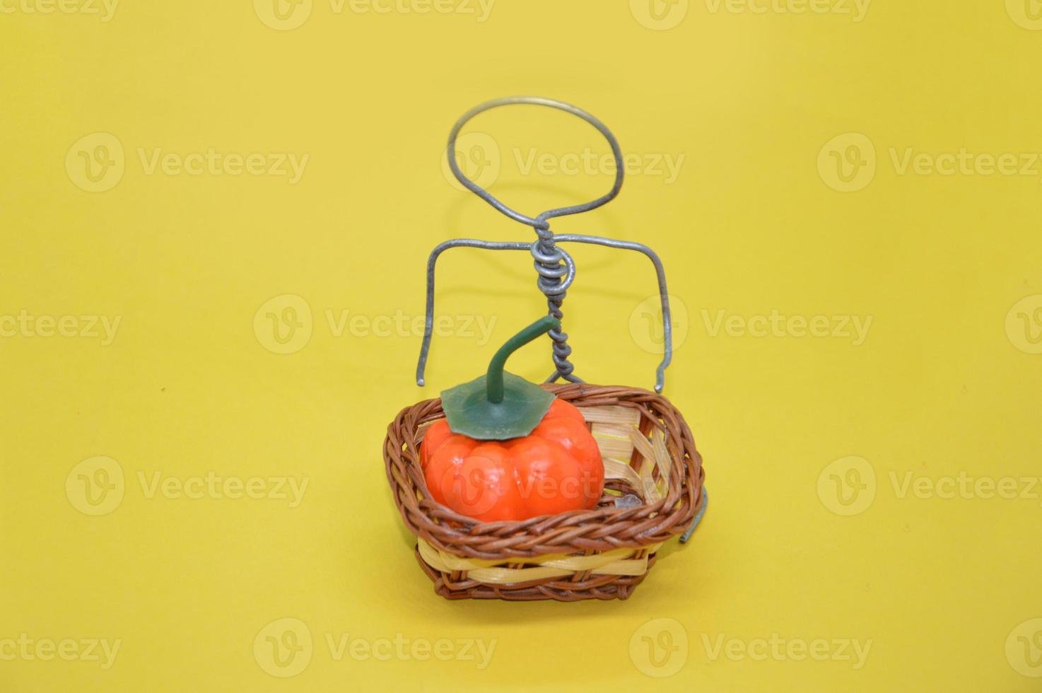 Human figure made of metal wire with an object photo