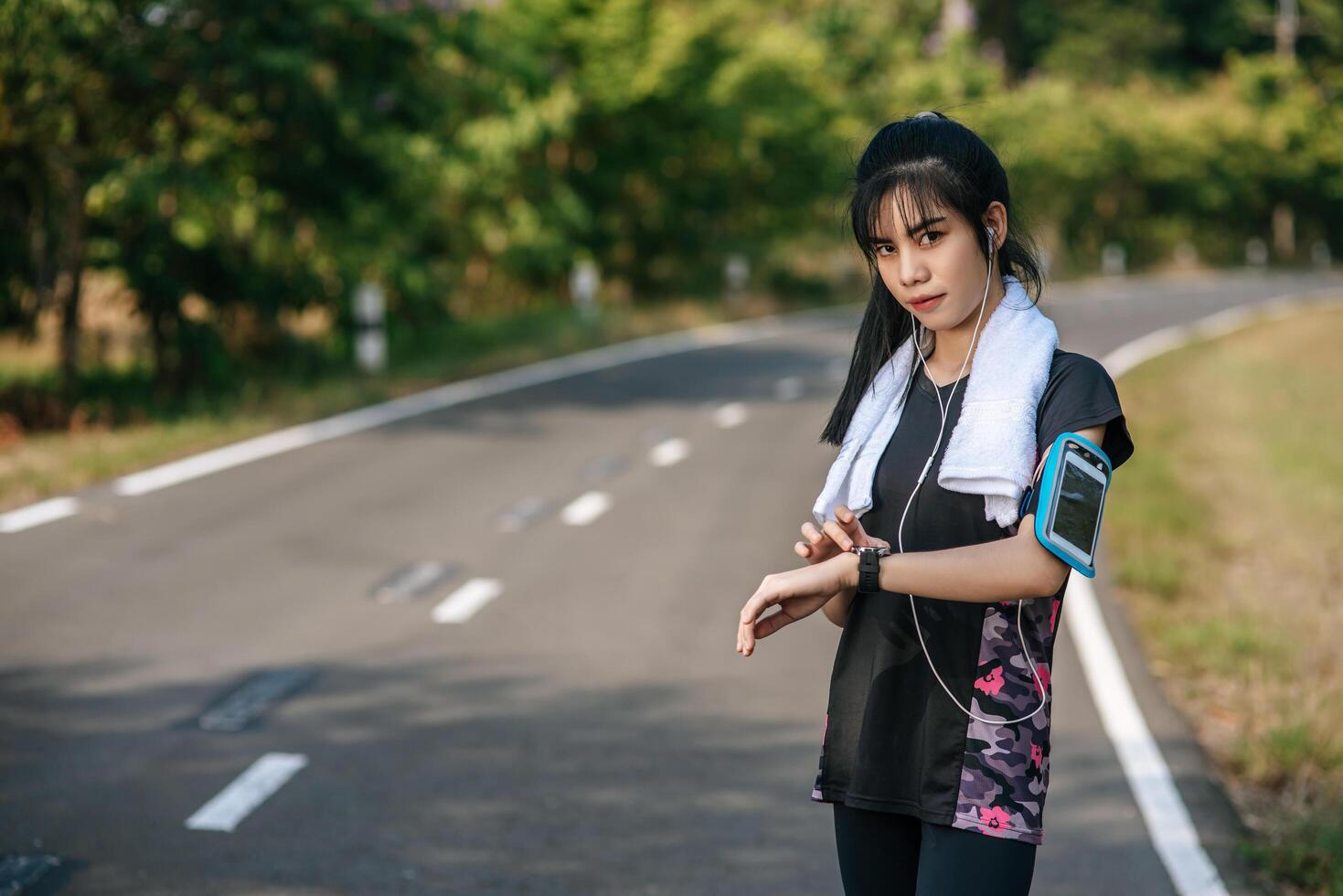 A woman stood relaxed after exercising. photo