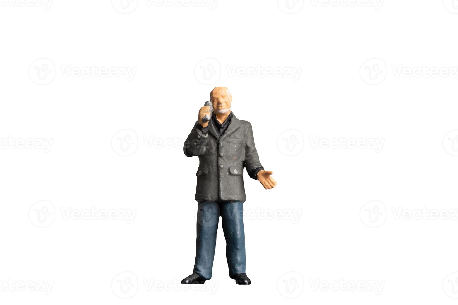 Reporter holding microphone  standing on white background with clipping path photo