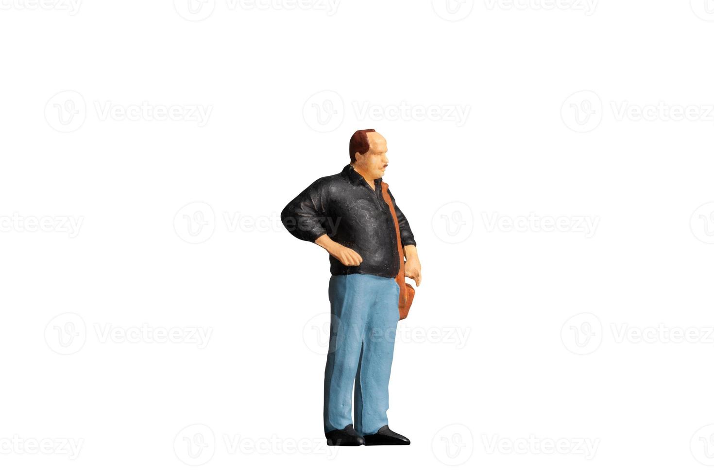 Miniature people Old man holding a shoulder bag  standing on white background with clipping path photo