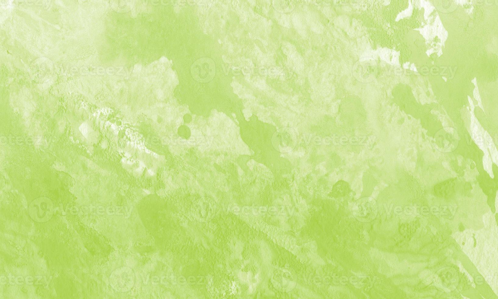 Creative abstract hand painted background with peridot color photo