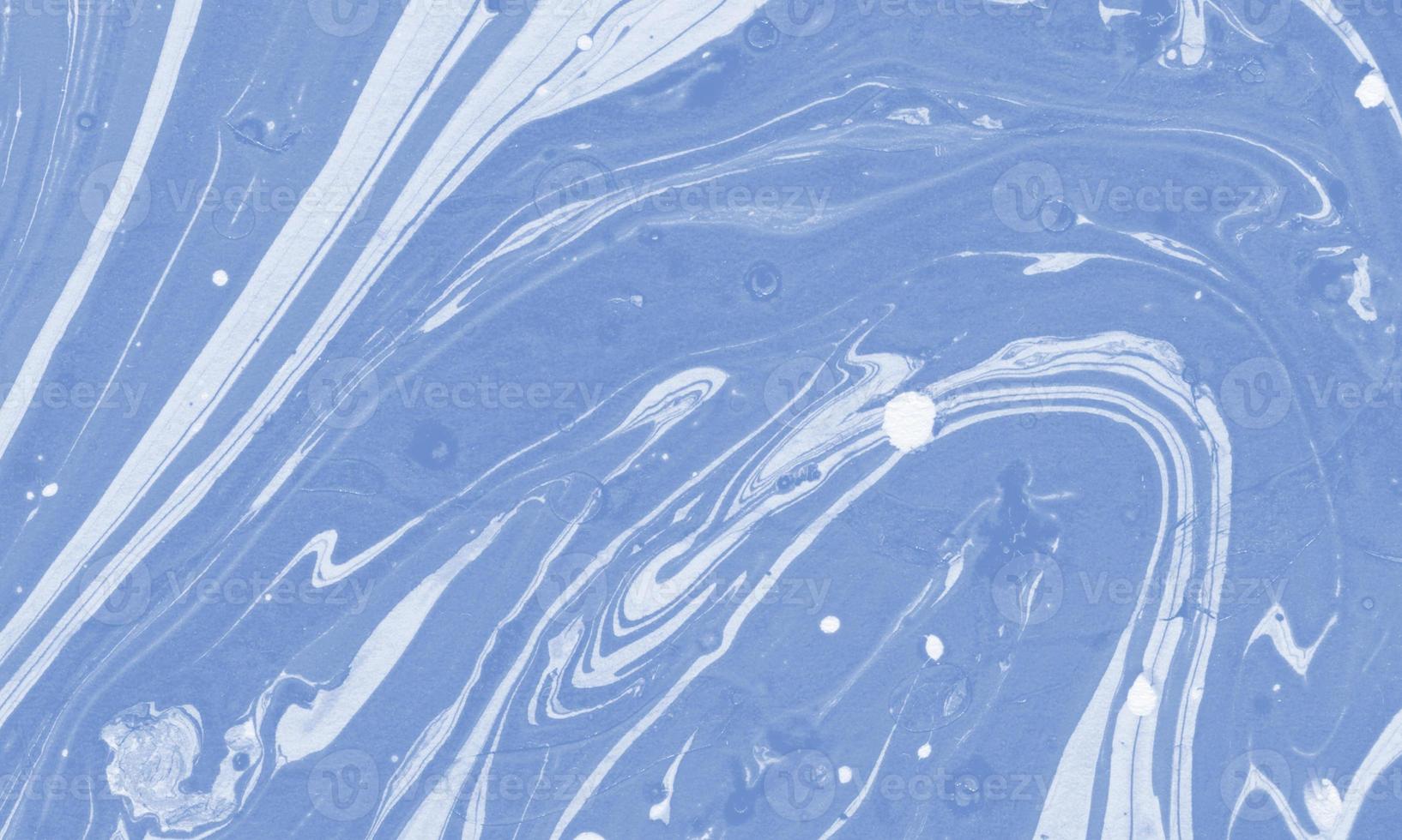Liquid marble painting background design with cornflower color photo