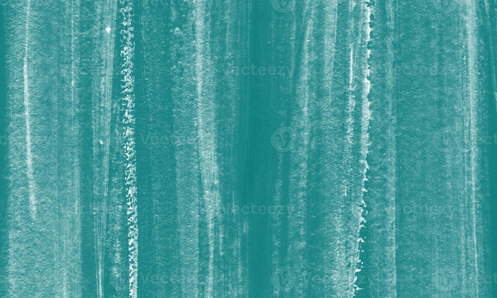 Creative abstract hand painted background with teal color photo