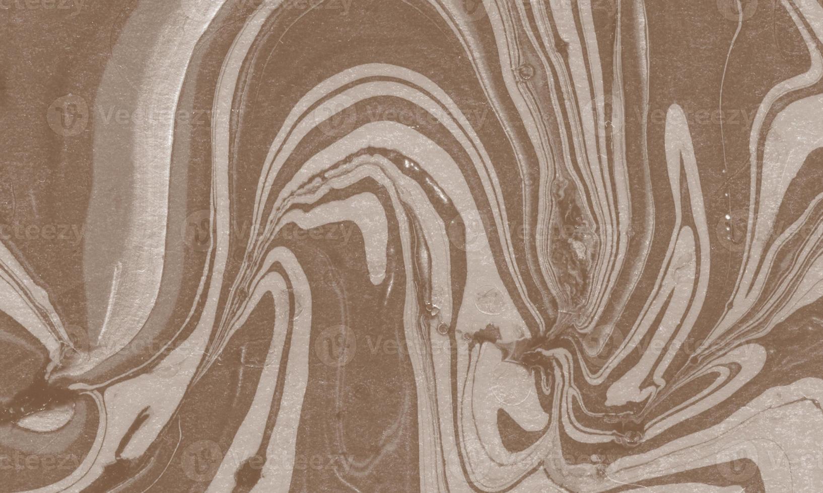 Liquid marble painting background design with coffee color photo