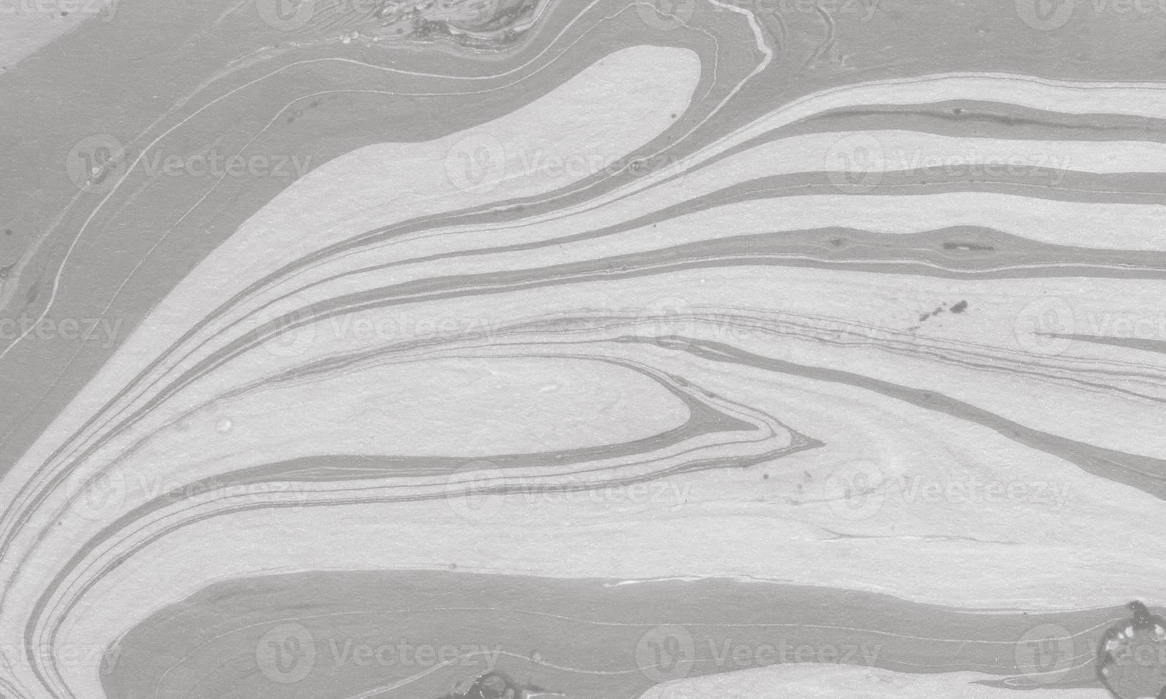 Realistic liquid marble background with gold with charcoal color photo