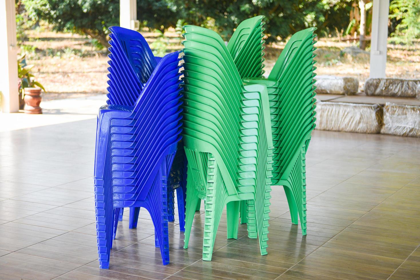 Green and blue chair storage on stack - Plastic chair photo