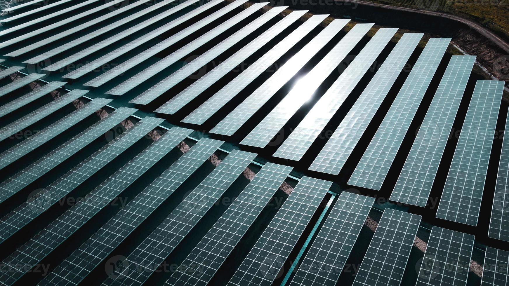 Solar cell panel from aerial view. Photo landscape of a solar farm producing clean energy.