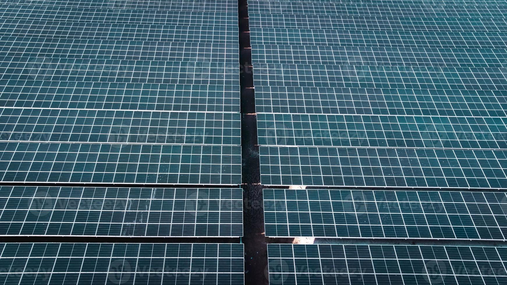 Solar cell panel from aerial view. Photo landscape of a solar farm producing clean energy.