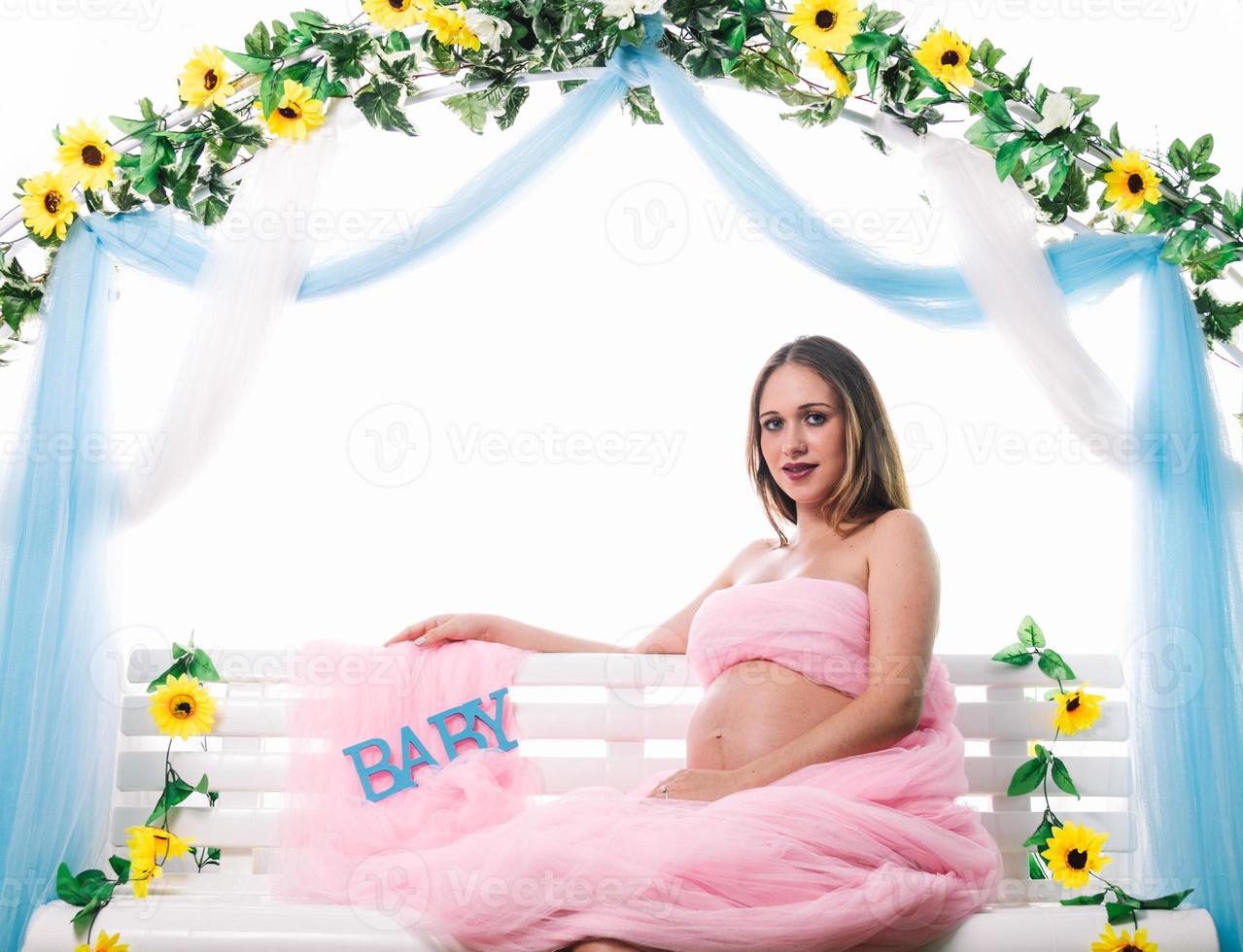 Young beautiful pregnant woman is posing. photo