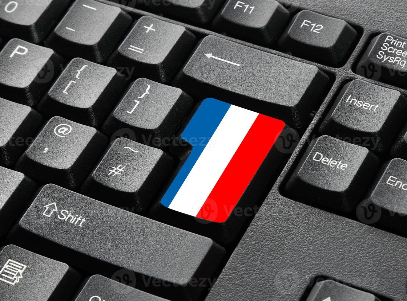 A Black Keyboard With Key In Flag Colours For Luxumberg photo