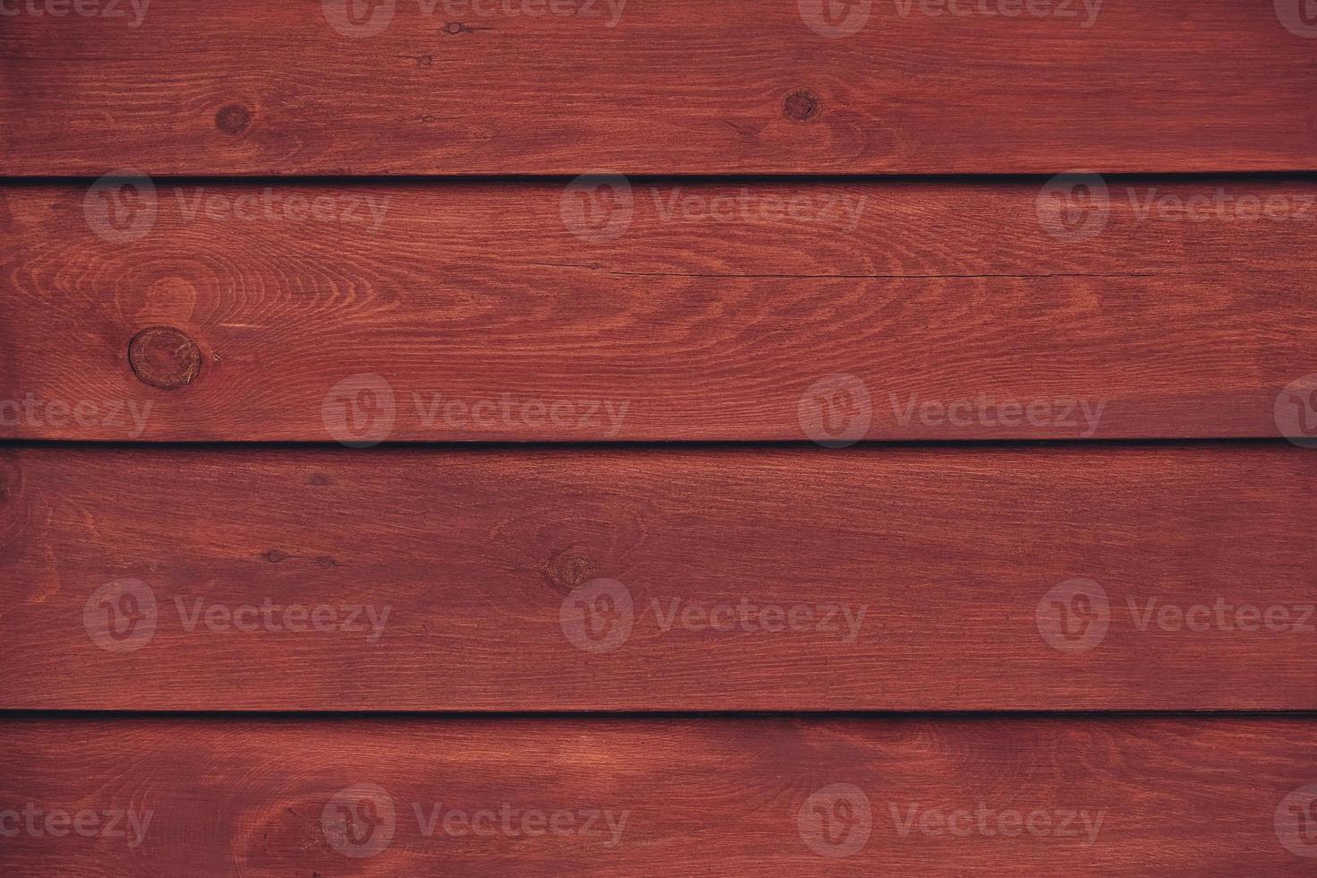 Structure of the mahogany surface as a background image. The creative concept of ecological nature. Background mahogany pattern photo